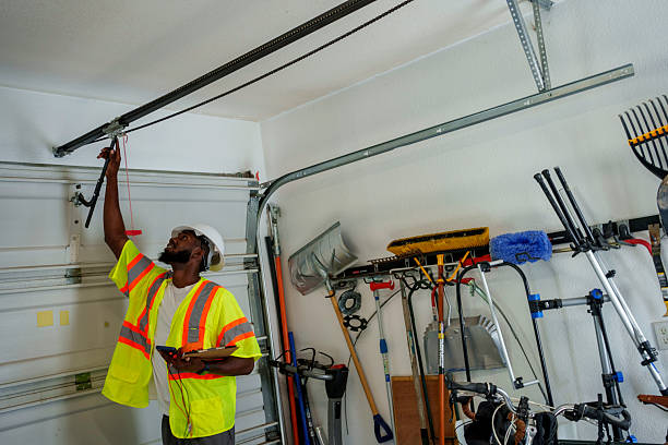 Professional Garage Door Spring Repair technician working in Tres Arroyos, NM